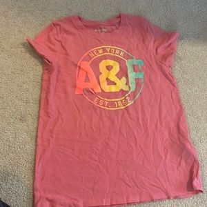 ABERCROMBIE KIDS PINK SHIRT. size 11/12 with colorful logo.